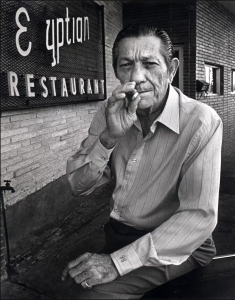 Joe Campisi smoking a cigarette outside the Egyptian Restaurant